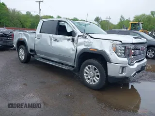 2020 GMC Sierra 2500HD Denali z VIN 1GT49RE79LF285364, wystawiony jako IAAI lot #42193961 z przebiegiem 18 595 mil mil oraz . Historia ofert i sprzedaży dostępna na DreamBid. Obrazek 1.