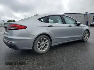 2020 Ford Fusion SE z VIN 3FA6P0HD0LR256243, wystawiony jako Copart lot #56513215 z przebiegiem 59 996 mil mil oraz Szkoda całkowita • Salvage title. Historia ofert i sprzedaży dostępna na DreamBid. Obrazek 3.