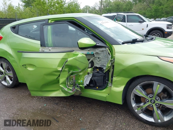 2012 Hyundai Veloster w/Gray Int with VIN KMHTC6AD6CU082432, listed as a IAAI auction lot 42121082 with 153,487 mi miles and . Bid and sale history available at DreamBid. Image 6.