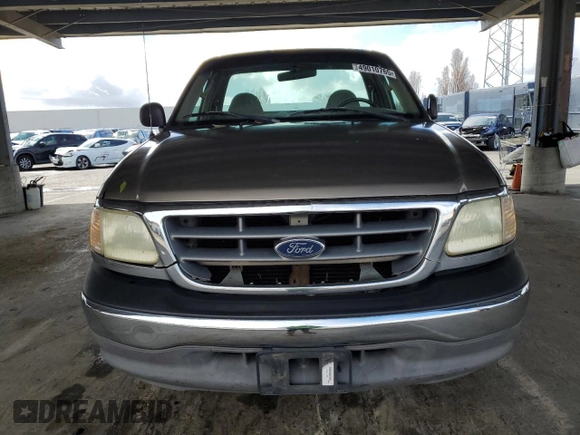 2002 Ford F-150 XL with VIN 1FTRF17W62NB40159, listed as a Copart auction lot 49010765 with 166,719 mi miles and Salvage Title. Bid and sale history available at carsss.com. Image 5.