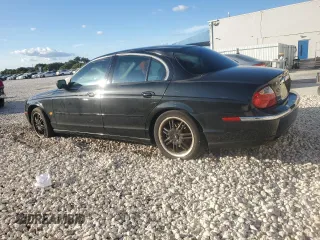 2000 Jaguar S-Type V8 z VIN SAJDA01D4YGL61655, wystawiony jako Copart lot #85873054 z przebiegiem 85 239 mil mil oraz Nie do naprawy • Non repairable. Historia ofert i sprzedaży dostępna na DreamBid. Obrazek 2.