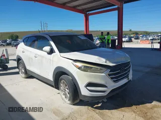 2017 Hyundai Tucson SE with VIN KM8J23A45HU328404, listed as a IAAI auction lot 41695180 with 120,458 mi miles. Bid and sale history available at carsss.com. Image 1.