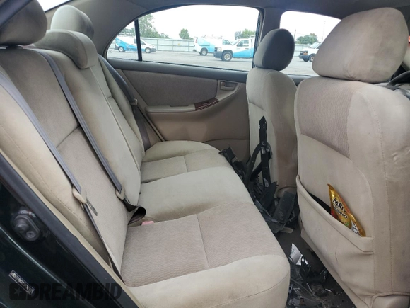 2007 Toyota Corolla CE z VIN 2T1BR32E57C801693, wystawiony jako Copart lot #57646375 z przebiegiem 221 264 mil mil oraz Szkoda całkowita • Salvage title. Historia ofert i sprzedaży dostępna na DreamBid. Obrazek 10.