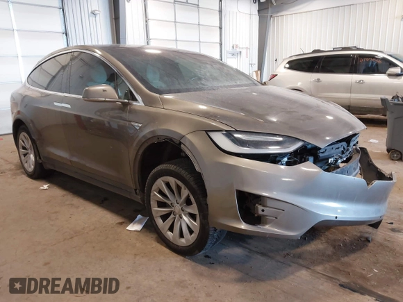 2016 Tesla Model X 70D with VIN 5YJXCBE27GF004974, listed as a IAAI auction lot 41630556 with 167,709 mi miles. Bid and sale history available at carsss.com. Image 1.