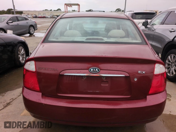 2006 Kia Spectra EX with VIN KNAFE121765251050, listed as a Copart auction lot 75120624 with 0 mi miles and Salvage Title. Bid and sale history available at carsss.com. Image 6.