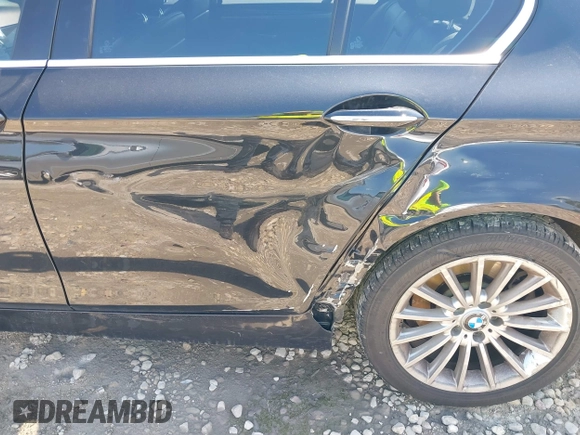 2013 BMW 5 Series 535i xDrive with VIN WBAFU7C55DDU66775, listed as a IAAI auction lot 42624788 with 155,868 mi miles and . Bid and sale history available at DreamBid. Image 6.