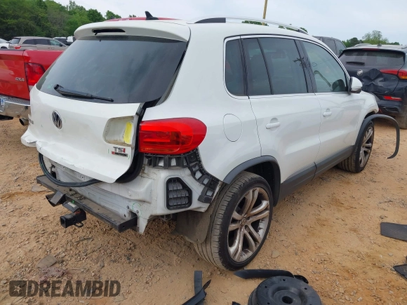2016 Volkswagen Tiguan S with VIN WVGBV7AXXGW585445, listed as a IAAI auction lot 42083377 with 111,011 mi miles and . Bid and sale history available at DreamBid. Image 4.