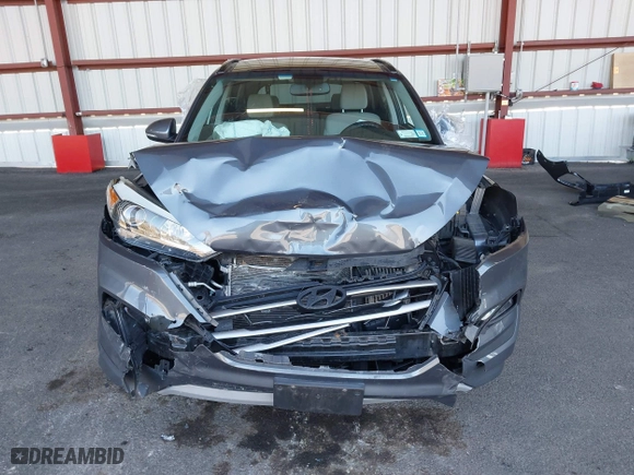 2018 Hyundai Tucson Value with VIN KM8J3CA20JU762120, listed as a IAAI auction lot 41878796 with 103,346 mi miles. Bid and sale history available at carsss.com. Image 12.