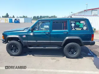 1995 Jeep Cherokee Sport with VIN 1J4FJ68S7SL631078, listed as a IAAI auction lot 42408148 with 190,765 mi miles and . Bid and sale history available at DreamBid. Image 14.