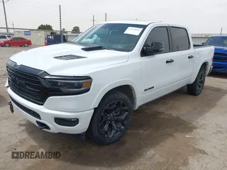 2023 Ram 1500 Limited with VIN 1C6SRFHT5PN576378, listed as a IAAI auction lot 42253096 with 41,802 mi miles and . Bid and sale history available at DreamBid. Image 2.