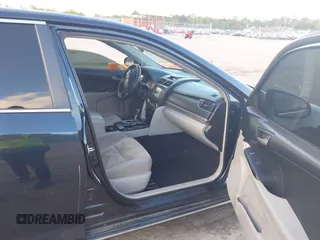 2014 Toyota Camry L with VIN 4T4BF1FK7ER349244, listed as a IAAI auction lot 42040599 with 186,545 mi miles. Bid and sale history available at carsss.com. Image 5.