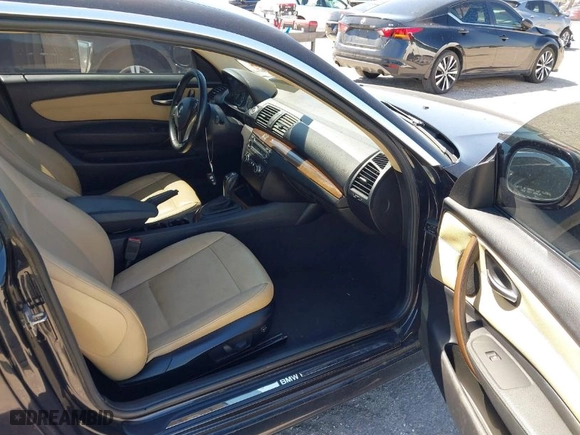 2011 BMW 1 Series 128i with VIN WBAUP7C55BVK78344, listed as a IAAI auction lot 41776367 with 138,351 mi miles. Bid and sale history available at carsss.com. Image 5.