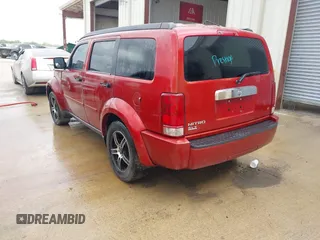 2007 Dodge Nitro SLT with VIN 1D8GT58K77W640112, listed as a IAAI auction lot 42015613 with 220,061 mi miles. Bid and sale history available at carsss.com. Image 3.