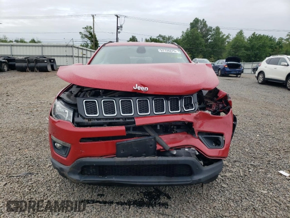 2019 Jeep Compass Latitude with VIN 3C4NJDBB7KT735802, listed as a Copart auction lot 57726275 with 58,660 mi miles and Salvage title. Bid and sale history available at DreamBid. Image 5.