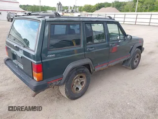 1993 Jeep Cherokee Sport with VIN 1J4FJ68S2PL622716, listed as a IAAI auction lot 42570145 with 183,159 mi miles and . Bid and sale history available at DreamBid. Image 4.