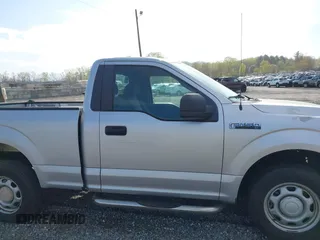 2015 Ford F-150 XL with VIN 1FTMF1C82FKD85016, listed as a IAAI auction lot 42019197 with 63,986 mi miles and . Bid and sale history available at DreamBid. Image 13.