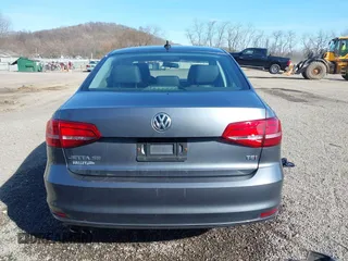 2015 Volkswagen Jetta Sedan 1.8T SE w/Connectivity with VIN 3VWD07AJ2FM312146, listed as a IAAI auction lot 41843238 with 107,741 mi miles. Bid and sale history available at carsss.com. Image 16.