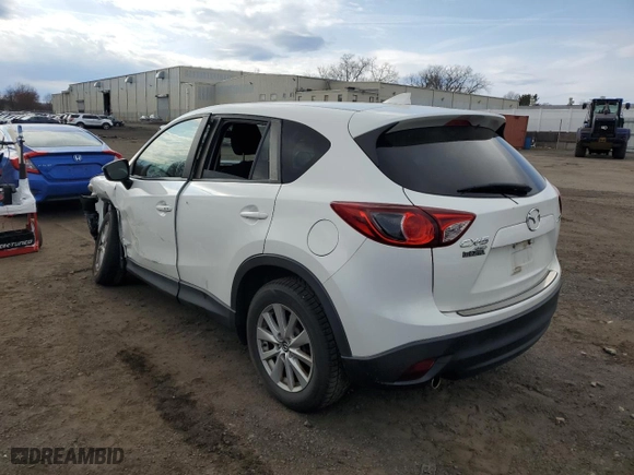 2016 Mazda CX-5 Touring with VIN JM3KE4CY5G0633095, listed as a Copart auction lot 51128965 with 126,351 mi miles and Salvage Title. Bid and sale history available at carsss.com. Image 2.