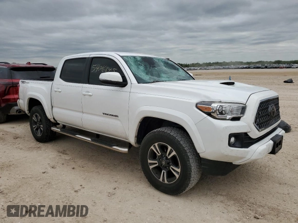 2018 Toyota Tacoma SR5 z VIN 5TFAZ5CNXJX065932, wystawiony jako Copart lot #52046845 z przebiegiem 61 980 mil mil oraz Szkoda całkowita • Salvage title. Historia ofert i sprzedaży dostępna na DreamBid. Obrazek 4.
