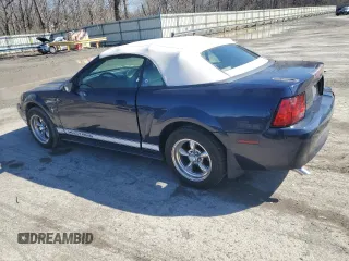 2002 Ford Mustang Deluxe with VIN 1FAFP44482F117034, listed as a Copart auction lot 50332965 with 95,923 mi miles and Salvage title. Bid and sale history available at DreamBid. Image 2.