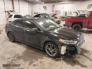 2020 Ford Fusion Hybrid Titanium with VIN 3FA6P0RU8LR141355, listed as a IAAI auction lot 41417807 with 61,288 mi miles. Bid and sale history available at carsss.com. Image 1.