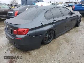 2014 BMW M5 with VIN WBSFV9C5XED593740, listed as a Copart auction lot 45210415 with 76,583 mi miles and Clean Title. Bid and sale history available at carsss.com. Image 3.