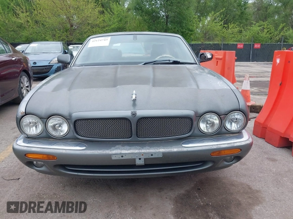 2002 Jaguar XJ with VIN SAJDA12CX2LF49531, listed as a IAAI auction lot 42124743 with 120,486 mi miles. Bid and sale history available at carsss.com. Image 6.