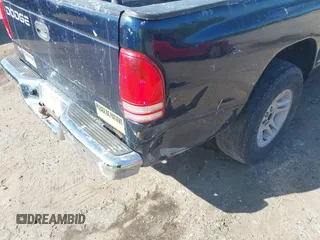 2001 Dodge Dakota Sport with VIN 1B7GL22N51S154848, listed as a IAAI auction lot 41941697 with 195,002 mi miles. Bid and sale history available at carsss.com. Image 6.