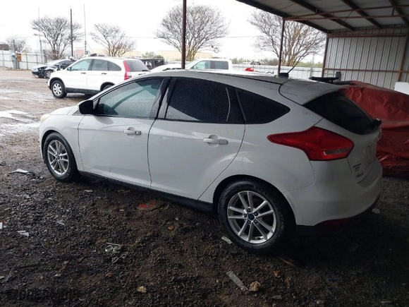 2015 Ford Focus SE with VIN 1FADP3K23FL276005, listed as a IAAI auction lot 41299511 with 156,865 mi miles. Bid and sale history available at carsss.com. Image 3.