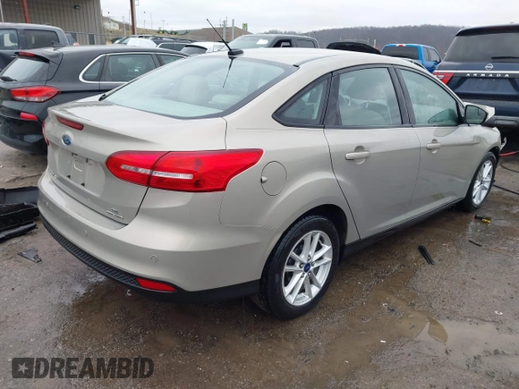 2015 Ford Focus SE with VIN 1FADP3F26FL299112, listed as a IAAI auction lot 41492446 with 57,103 mi miles. Bid and sale history available at carsss.com. Image 4.