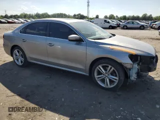 2014 Volkswagen Passat SE z VIN 1VWBT7A3XEC038811, wystawiony jako Copart lot #55198795 z przebiegiem 119 497 mil mil oraz Szkoda całkowita • Salvage title. Historia ofert i sprzedaży dostępna na DreamBid. Obrazek 4.