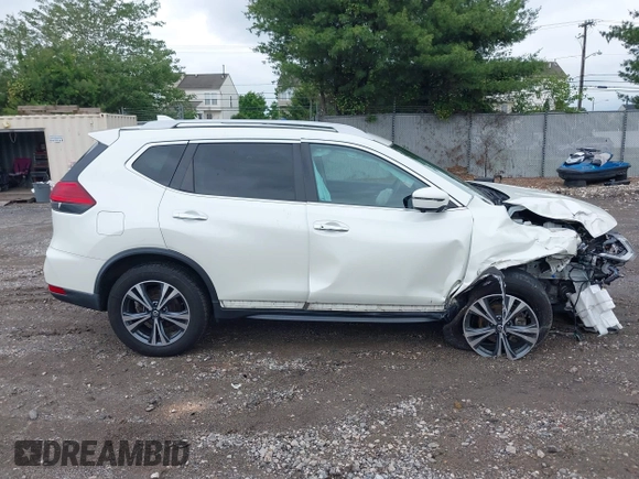 2017 Nissan Rogue SV with VIN 5N1AT2MVXHC844775, listed as a IAAI auction lot 42351482 with 87,195 mi miles and . Bid and sale history available at DreamBid. Image 13.