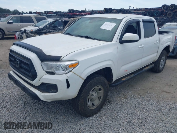 2022 Toyota Tacoma SR with VIN 3TYCZ5AN9NT098903, listed as a IAAI auction lot 42088505 with 93,000 mi miles and . Bid and sale history available at DreamBid. Image 2.
