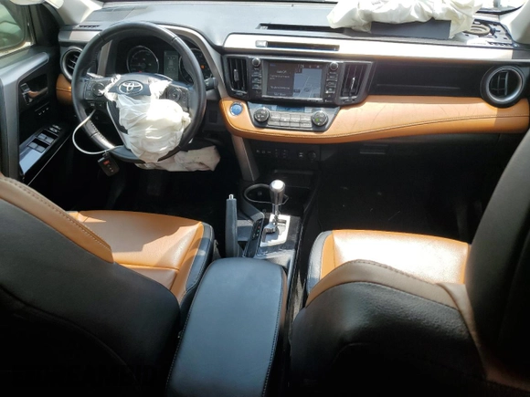2016 Toyota RAV4 Limited with VIN JTMDJREV9GD027207, listed as a Copart auction lot 60350255 with 144,345 mi miles and Salvage title. Bid and sale history available at DreamBid. Image 8.