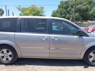 2013 Dodge Grand Caravan SE with VIN 2C4RDGBG0DR702913, listed as a IAAI auction lot 42007786 with 163,981 mi miles and . Bid and sale history available at DreamBid. Image 13.