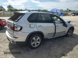 2012 BMW X5 35d with VIN 5UXZW0C51CL668064, listed as a Copart auction lot 62217845 with 140,544 mi miles and Salvage title. Bid and sale history available at DreamBid. Image 3.