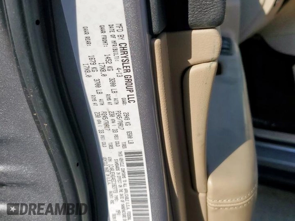 2014 Jeep Grand Cherokee Laredo with VIN 1C4RJEAG4EC182773, listed as a Copart auction lot 54085255 with 138,775 mi miles and Salvage Title. Bid and sale history available at DreamBid. Image 13.