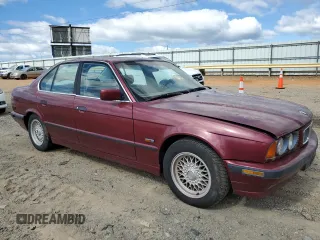 1995 BMW 5 Series 525i z VIN WBAHD632XSGK86387, wystawiony jako Copart lot #58245795 z przebiegiem 168 925 mil mil oraz Czysty tytuł • Clean title. Historia ofert i sprzedaży dostępna na DreamBid. Obrazek 4.