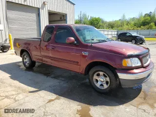 1999 Ford F-150 Work Series with VIN 1FTRX17WXXNC12811, listed as a Copart auction lot 52537395 with 0 mi miles and Salvage Title. Bid and sale history available at carsss.com. Image 4.