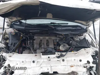 1999 Ford Taurus SE with VIN 1FAFP53S4XA185115, listed as a IAAI auction lot 41263216 with 182,770 mi miles. Bid and sale history available at carsss.com. Image 10.