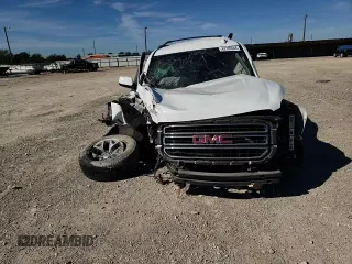 2015 GMC Yukon XL SLE z VIN 1GKS1GKC1FR643293, wystawiony jako Copart lot #82106544 z przebiegiem 164 623 mil mil oraz Szkoda całkowita • Salvage title. Historia ofert i sprzedaży dostępna na DreamBid. Obrazek 12.