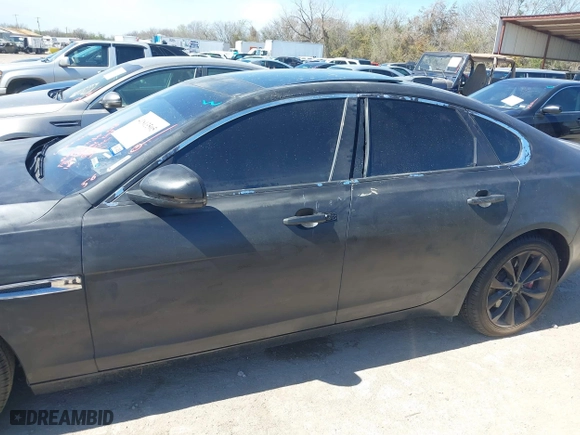 2019 Jaguar XF 25t Premium with VIN SAJBD4FX3KCY79425, listed as a IAAI auction lot 41813505 with 64,787 mi miles. Bid and sale history available at carsss.com. Image 14.
