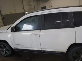 2016 Jeep Compass High Altitude Edition with VIN 1C4NJDEB6GD733760, listed as a IAAI auction lot 41667712 with 119,789 mi miles. Bid and sale history available at carsss.com. Image 15.