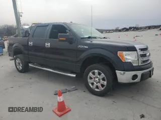 2014 Ford F-150 XL with VIN 1FTFW1CF3EKG41038, listed as a Copart auction lot 48328585 with 104,492 mi miles and Salvage Title. Bid and sale history available at carsss.com. Image 4.