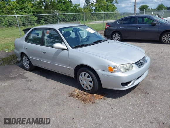 2002 Toyota Corolla CE with VIN 1NXBR12E12Z581660, listed as a IAAI auction lot 42654124 with 115,950 mi miles and . Bid and sale history available at DreamBid. Image 1.