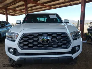 2023 Toyota Tacoma 4WD SR with VIN 3TMCZ5AN8PM650793, listed as a IAAI auction lot 41664712 with 9,427 mi miles. Bid and sale history available at carsss.com. Image 13.