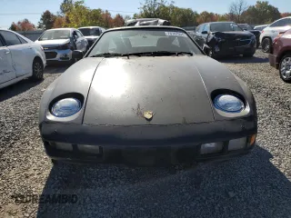 1985 Porsche 928 z VIN WP0JB0928FS861121, wystawiony jako Copart lot #76747554 z przebiegiem 73 056 mil mil oraz Tytuł czysty. Historia ofert i sprzedaży dostępna na DreamBid. Obrazek 5.