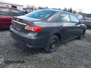 2013 Toyota Corolla L with VIN 5YFBU4EE8DP203741, listed as a IAAI auction lot 41943422 with 148,803 mi miles and . Bid and sale history available at DreamBid. Image 4.