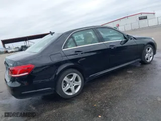 2014 Mercedes-Benz E-Class E 350 Luxury with VIN WDDHF8JB1EA978238, listed as a IAAI auction lot 41535195 with 132,940 mi miles. Bid and sale history available at carsss.com. Image 4.