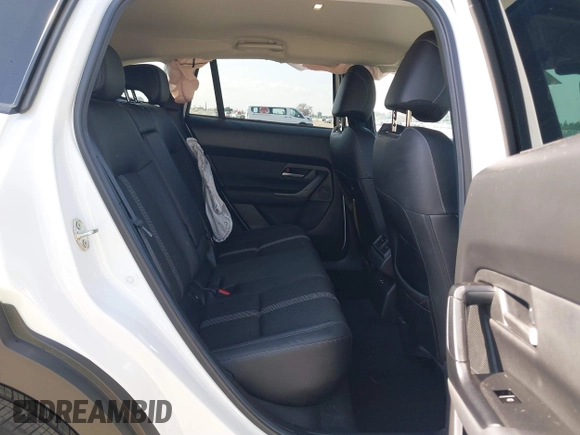 2024 Mazda CX-50 S Select with VIN 7MMVABAM2RN242725, listed as a IAAI auction lot 41477519 with 4,808 mi miles and . Bid and sale history available at DreamBid. Image 8.